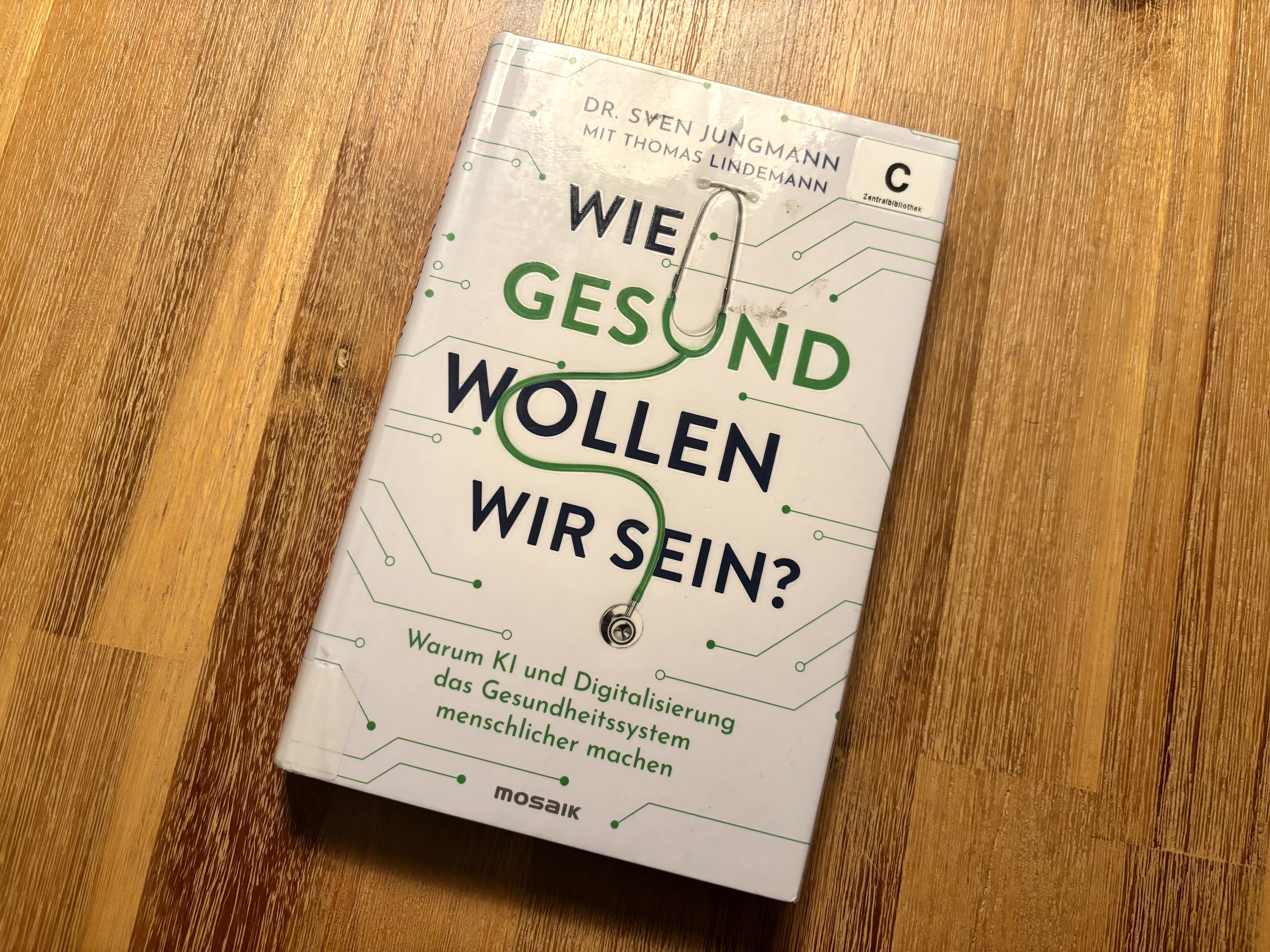 Buchcover von „Wie gesund wollen wir sein?" von Dr. Sven Jungmann mit Thomas Lindemann, mosaik Verlag